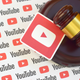 A gavel on top of the youtube logo.